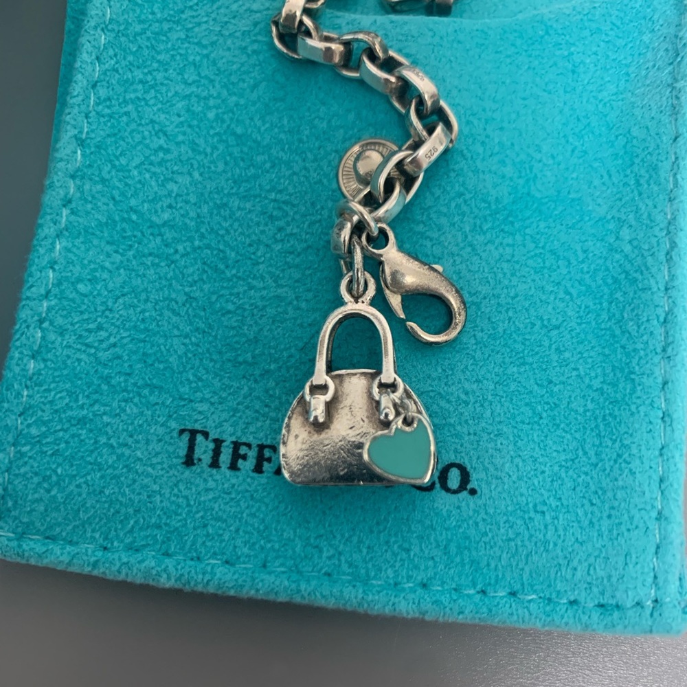 Tiffany & Co. retired sterling silver handbag charm and bracelet